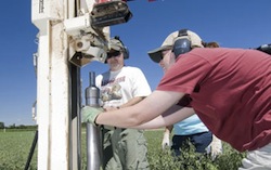 Collection of soil samples to determine carbon storage Photo K Stepnitz MSU