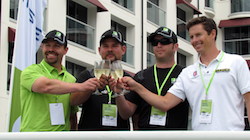 From left, Pat O'Keefe, Michael von Disterlo and Luke Lonberger of CLP Motorsports join X Games Gold Medal Winner Tanner Foust in toasting the successful conclusion of the 2,507-mile cross-country drive on one tank of Neste NEXBTL renewable diesel in Santa Monica, CA. (PRNewsFoto/Neste)