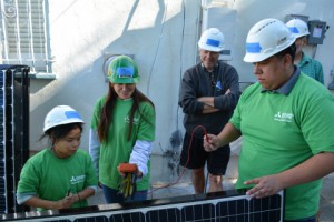 At the second installation, volunteers installed a 2.7kW solar system. (Photo: Business Wire)