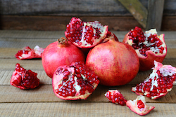 © Olhaafanasieva | Dreamstime.com - Ripe Pomegranates On A Rustic Table 