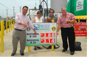 Maui County Council Vice Chair Don Guzman, who proposed the tax exemption, shows his support for the biodiesel price rollback with Kelly and Bob King, Pacific Biodiesel founders, and Councilmember Don Couch. Photo: Pacific Biodiesel Technologies