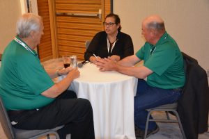 From left to right: Dale Christensen, Glacial Lakes Energy; Joanna Schroeder, Energy.Agwired.com; and Mark Schmidt, Glacial Lakes Energy, discuss the Premium E30 Challenge during the 29th Ethanol Conference. 