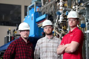 Lysle Whitmer, Ryan Smith and Martin Haverly, left to right, led the development of a pilot plant as part of a joint biofuels project with Chevron U.S.A. Larger photo. Photos by Christopher Gannon.