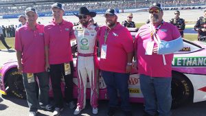 American Ethanol Sweepstakes winners received the ultimate experience during the NASCAR race at Talledega. Pictured here are the winners with driver Austin Dillion. 